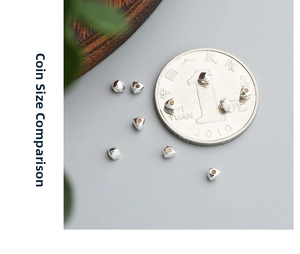 Macro shot of S925 sterling silver geometric triangle spacer beads for DIY jewelry making