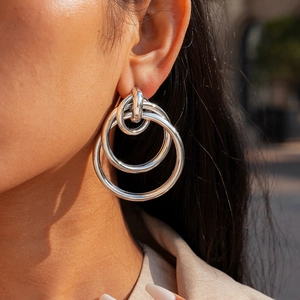 Minimalist silver interlocking triple hoop earrings for women in a modern geometric style
