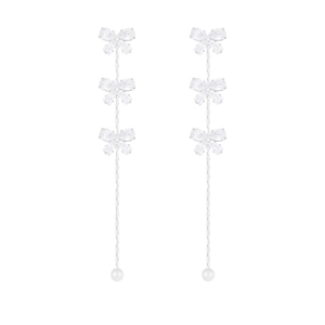 Elegant silver bow tassel earrings with sparkling cubic zirconia and white pearls