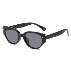 Vintage black cat-eye sunglasses with thick frames and grey lenses for a retro fashion look