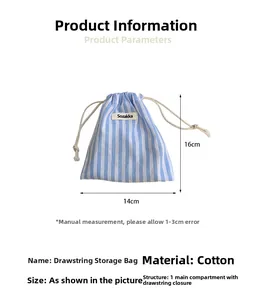Detail showing blue and white striped cotton drawstring storage bag with 14x16cm dimensions