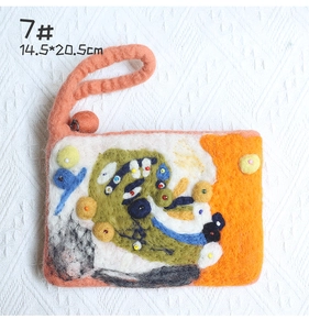 Detail view of handmade wool felt pouch with abstract colorful patterns and dimensions 14.5x20.5cm