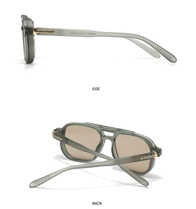 Detail view of retro aviator sunglasses with frosted green frames and gold T-hinges
