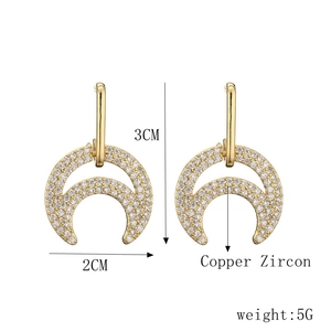 Detail showing dimensions of golden crescent earrings with micro-inlaid cubic zirconia