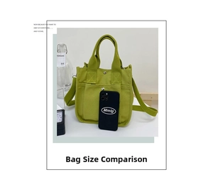 Detail showing grass green canvas tote bag size comparison with a phone and strap