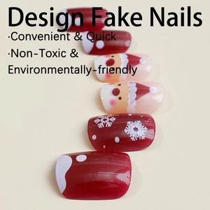 Christmas press-on nails with Santa Claus and snowflake designs in red and white colors