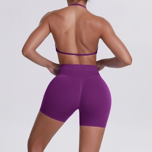 Detailed back view of high-waisted peach lift yoga shorts with ergonomic stitching