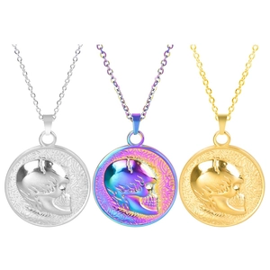 Three round skull relief pendants in gold, silver and colorful finishes for DIY jewelry