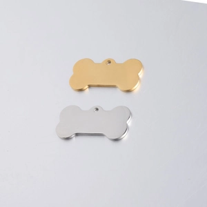 Polished bone-shaped stainless steel dog tags in gold and silver finish with hanging holes