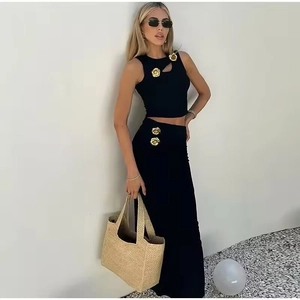 Women's sexy black knit two-piece set with sleeveless crop top and high-waisted skirt