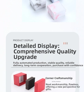 Detailed view of square marble pattern gift boxes with protective sponge inserts