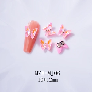 Detail of aurora pink crystal 3D butterfly nail charms with 10x12mm size measurements