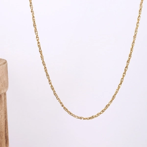 Detailed close-up of 18k gold plated stainless steel cable chain necklace for layering