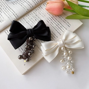 Elegant satin bow hair ties with pearls and beads in black and cream white colors