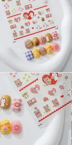 Detailed view of 3D embossed cartoon bear nail art stickers with matte texture KX314