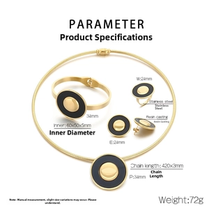 Detailed view of luxury gold-plated stainless steel jewelry set with black circular pendants