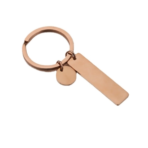 Polished rose gold stainless steel keychain with rectangle and round tags for engraving