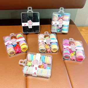 Kid hair accessories set with elastic bands and mini claw clips in a clear storage box