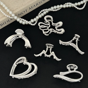 Minimalist silver metal claw clips set in various geometric shapes for women's hair styling