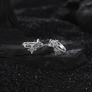 Elegant S925 sterling silver star earrings with colorful zircon on black mineral stone
