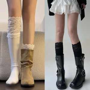 Detailed comparison of white and black lace trim calf socks with stylish boots