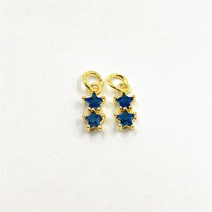 Golden double star pendant with deep blue crystals and micro-set cubic zirconia charms
