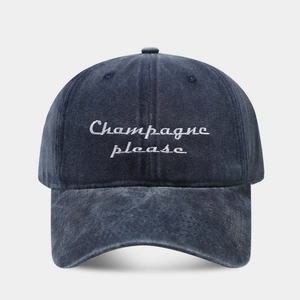 Retro washed denim baseball cap with white Champagne Please embroidery and curved brim