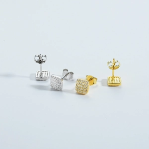 Detail of square S925 sterling silver stud earrings with pave zircon and honeycomb back