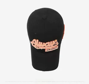 Top view of a black baseball cap featuring orange Always New York City embroidery