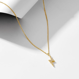 Minimalist S925 sterling silver lightning bolt necklace in gold with shimmering crystals