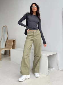 Slim fit dark grey long sleeve T-shirt styled with cargo pants and a black handbag