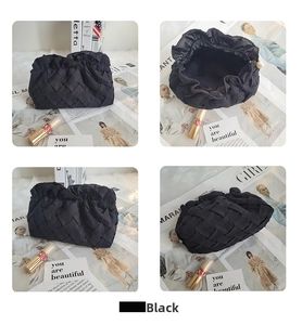 Detail of black woven evening clutch bag with pearl zipper and large interior capacity