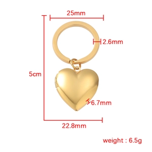 Detailed technical diagram of 6.5g gold heart locket keychain with exact dimensions