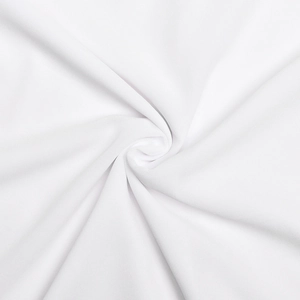 Macro detail of the soft white fabric texture on this sexy backless maxi dress