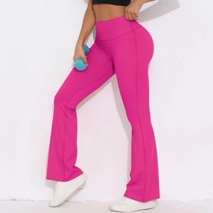 Close-up of high-waist flared yoga pants in deep pink color with side pocket feature