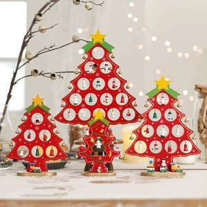 Mini wooden DIY Christmas tree tabletop decorations with snowmen and festive ornaments