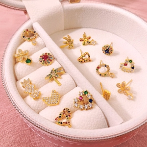 Colorful zircon stud earring set with heart and flower designs in a pink box