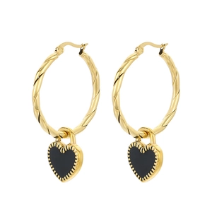 Golden rope hoop earrings with black heart enamel charms in a minimalist vintage style