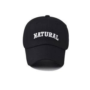 Close-up of NATURAL white embroidery on high-quality black cotton twill baseball cap