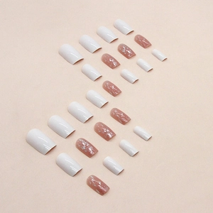 Pearly white and marble pink press-on nails in medium square shape with silver foil