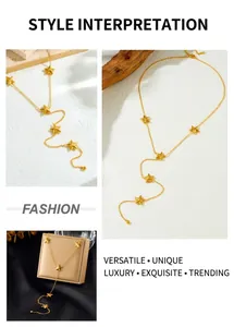 Macro shot of gold star tassel necklace with brushed finish five-pointed star charms
