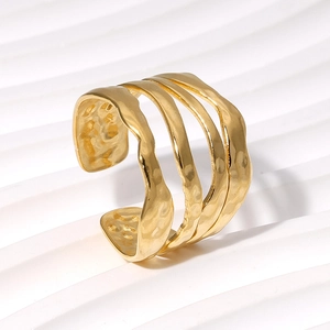 Minimalist 18K gold plated stainless steel ring featuring irregular four-layer hammered waves
