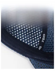 Detail of breathable mesh fabric and wide sweatband on dark blue baseball cap