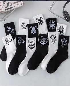 Detail of high-quality knit crew socks featuring graffiti prints and WHY SO SERIOUS text