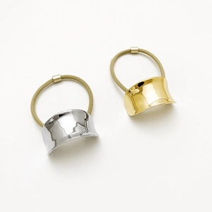 Minimalist high-shine gold and silver concave metal hair rings for elegant ponytails