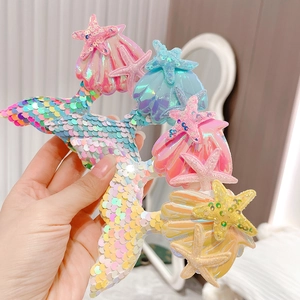 Sparkly mermaid tail shell and starfish hair clips for kids in pastel sequined colors