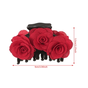 Detail view of red velvet rose hair claw clip with size dimensions 9cm by 5.5cm