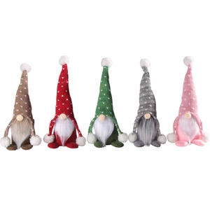 Five Christmas gnomes set with knitted polka dot hats and plush long white beards