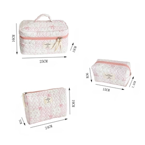 Detailed size specifications for pink quilted cosmetic bags in three different sizes