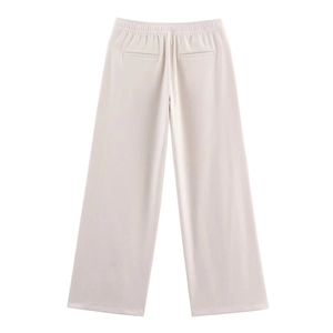 Vue arrière du pantalon beige à jambes larges avec taille haute élastique et poches déco